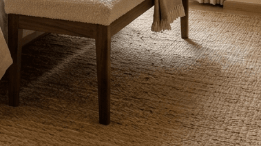 Macro texture of solid walnut wood grain showing rich dark tones and smooth finish