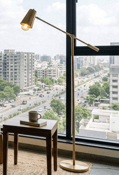 Aksh Spun Brass Floor Lamp in ambient evening light